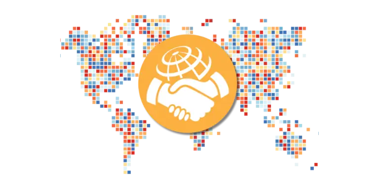 World map with a handshake symbol, representing Agrim Ayu Care’s global community of wellness enthusiasts connected through Ayurved.