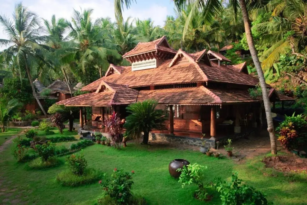 Traditional Ayurved retreat surrounded by nature, reflecting holistic wellness philosophy